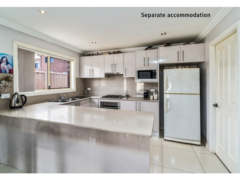 15 Rogan Crescent, Prairiewood NSW 2176