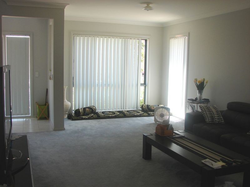 4 Hadlow Avenue, Glenfield NSW 2167