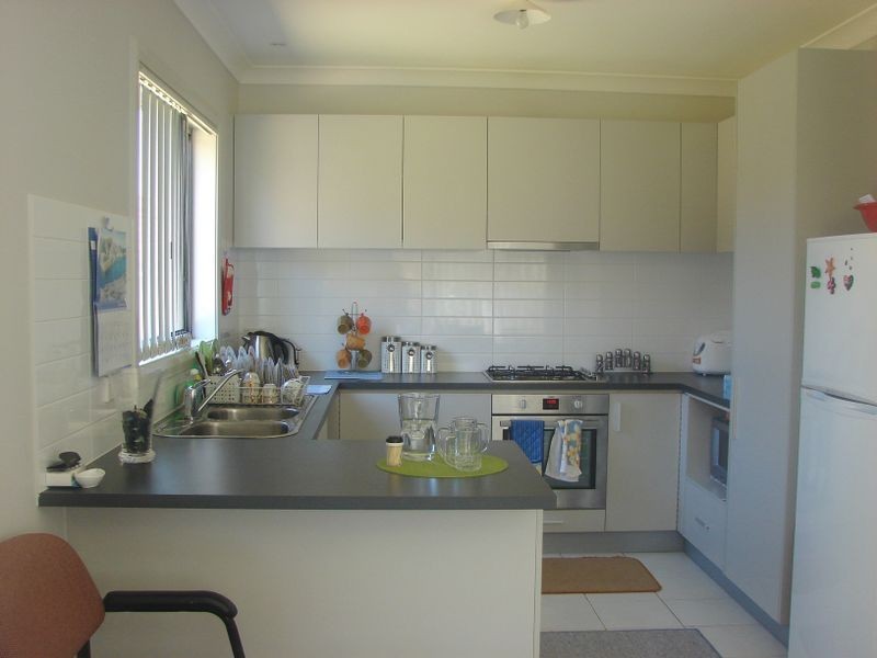 4 Hadlow Avenue, Glenfield NSW 2167