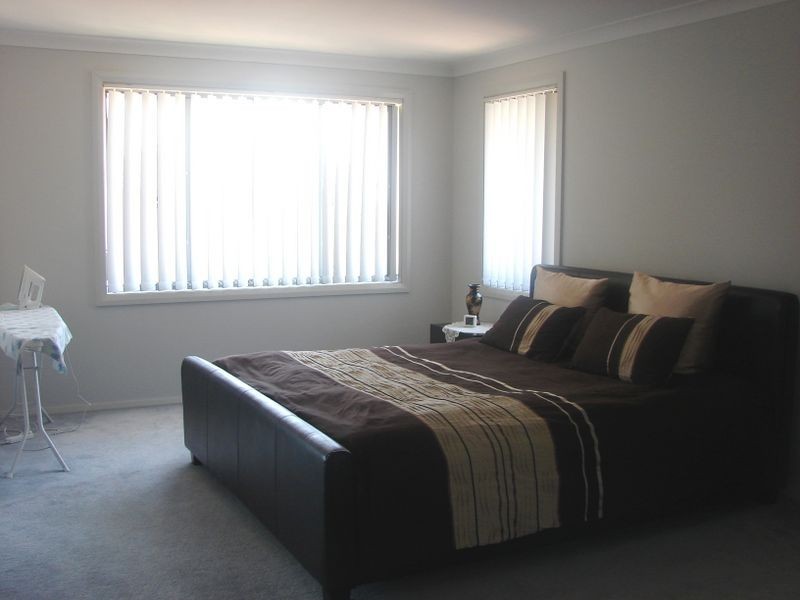 4 Hadlow Avenue, Glenfield NSW 2167