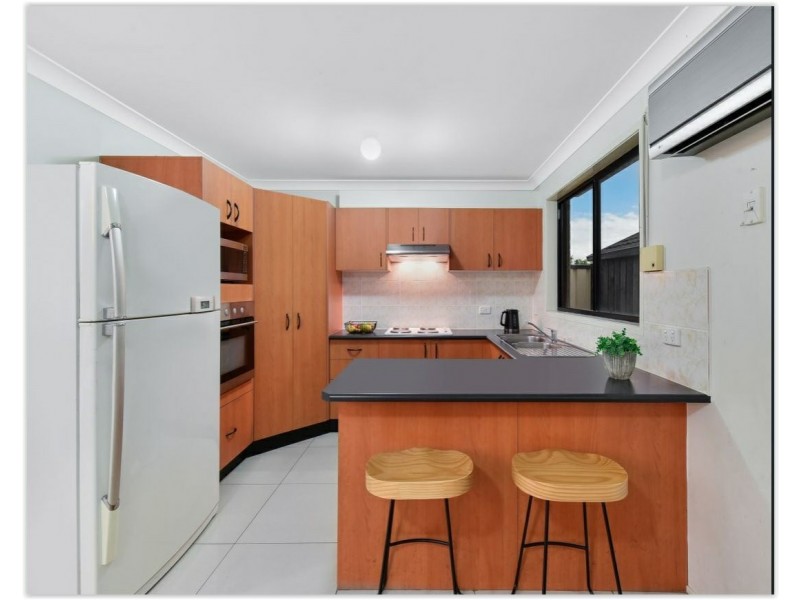 22 Norman Dunlop Crescent, Minto NSW 2566