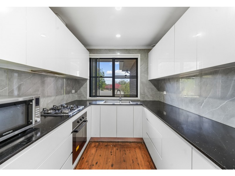 1 Emex Place, Macquarie Fields NSW 2564