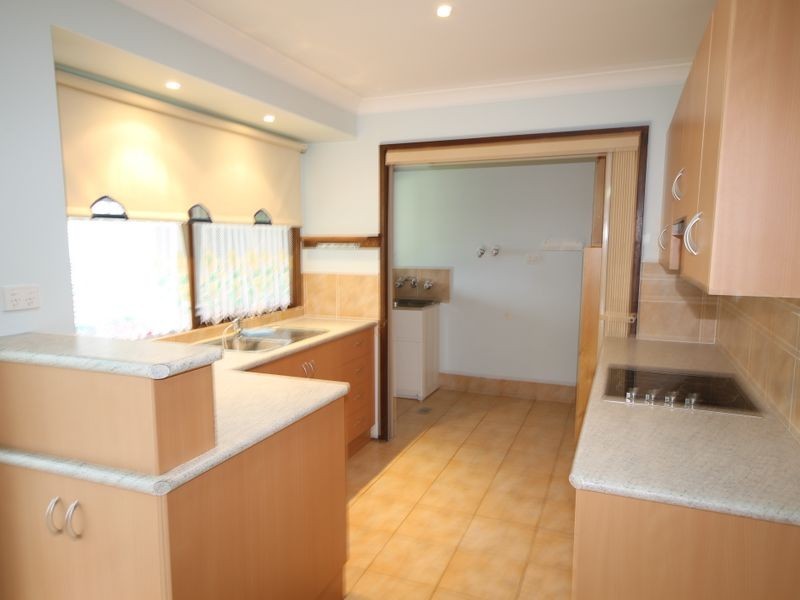 64 Waratah Crescent, Sanctuary Point NSW 2540