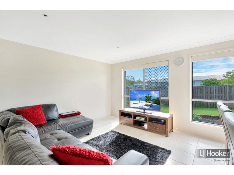 59 Harmsworth Road, Pacific Pines QLD 4211