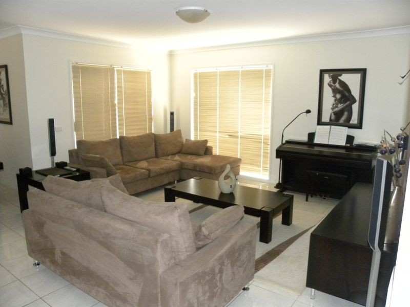 8 Cherry Blossom Crescent, Hamlyn Terrace NSW 2259