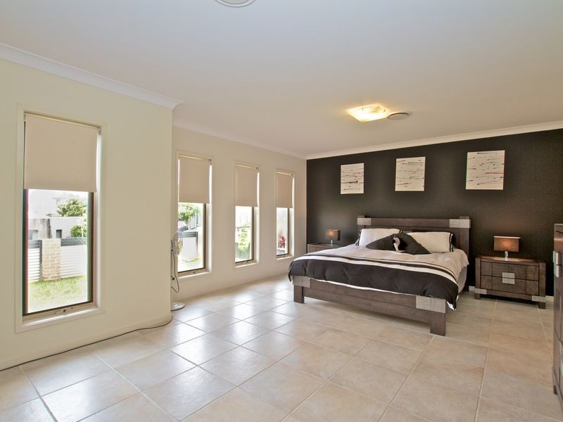8 Arragan Court, Pacific Pines QLD 4211