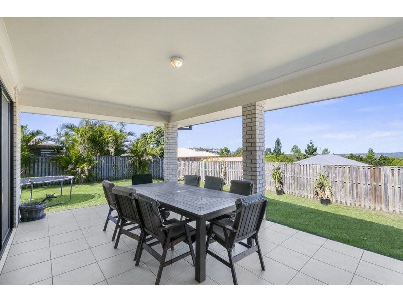 31 Harmsworth Road, Pacific Pines QLD 4211