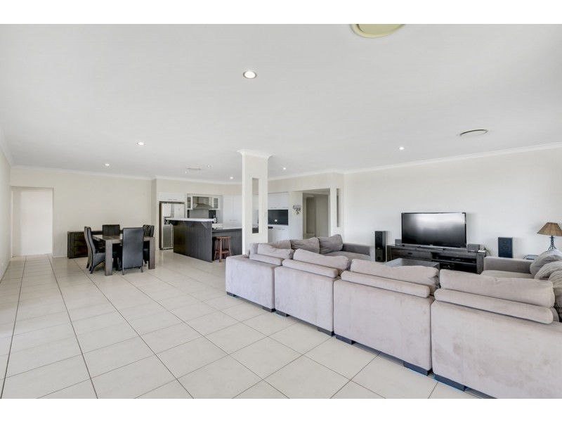 31 Harmsworth Road, Pacific Pines QLD 4211