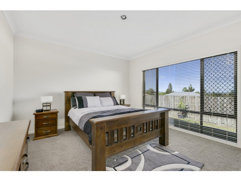 31 Harmsworth Road, Pacific Pines QLD 4211