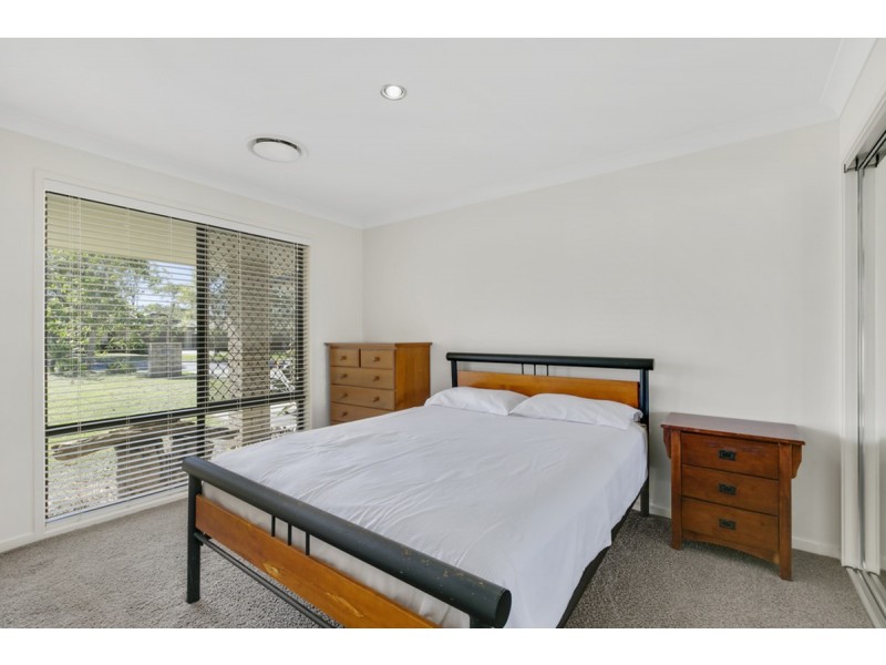 31 Harmsworth Road, Pacific Pines QLD 4211