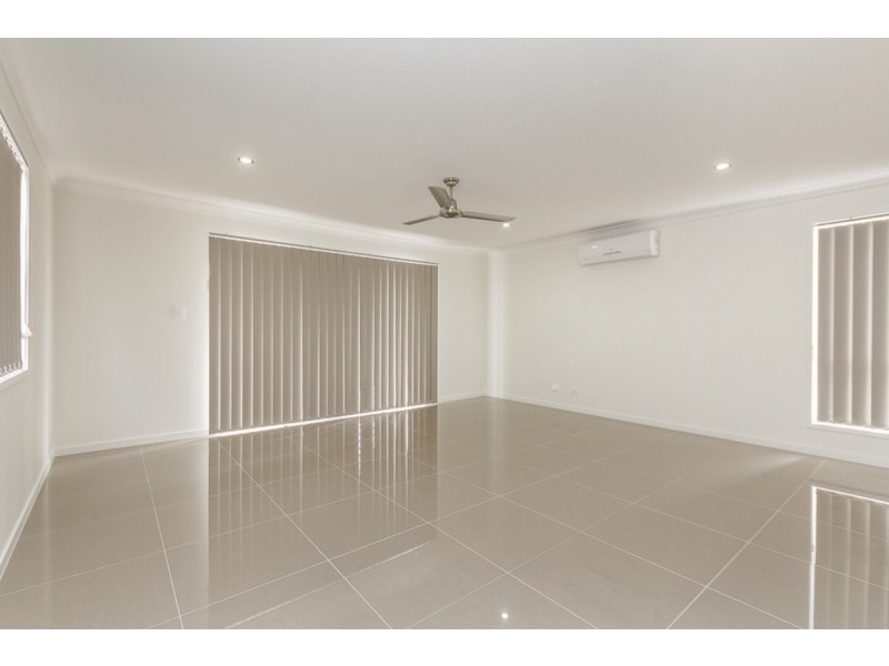 65 Macintyre Parade, Pacific Pines QLD 4211