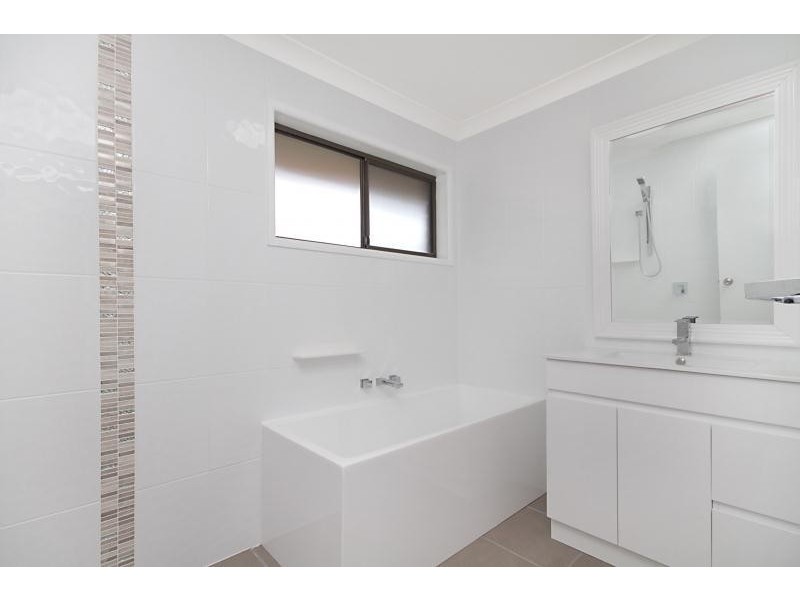 54 K P McGrath Drive, Elanora QLD 4221