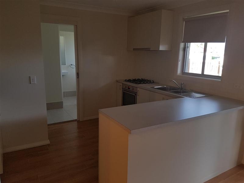 5 Northampton Drive, Glenfield NSW 2167