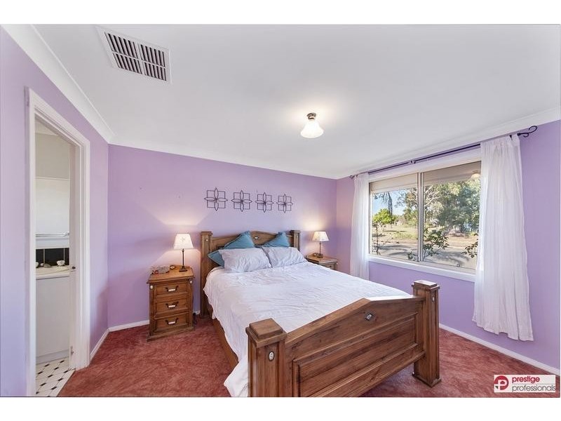 15 Arrowfield Drive, Wattle Grove NSW 2173