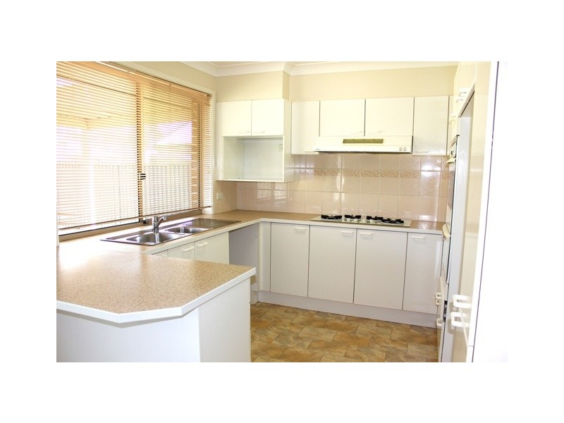 6 Corryton Court, Wattle Grove NSW 2173