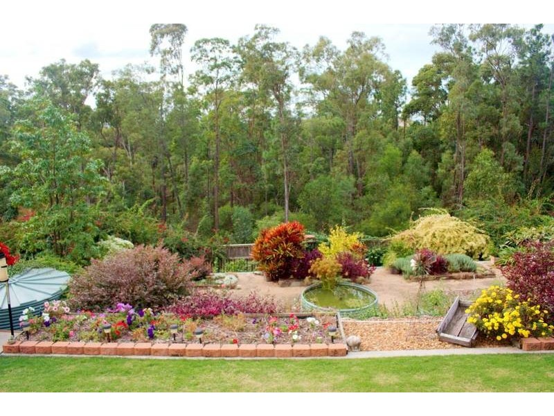 11 Huxley Court, Pacific Pines QLD 4211