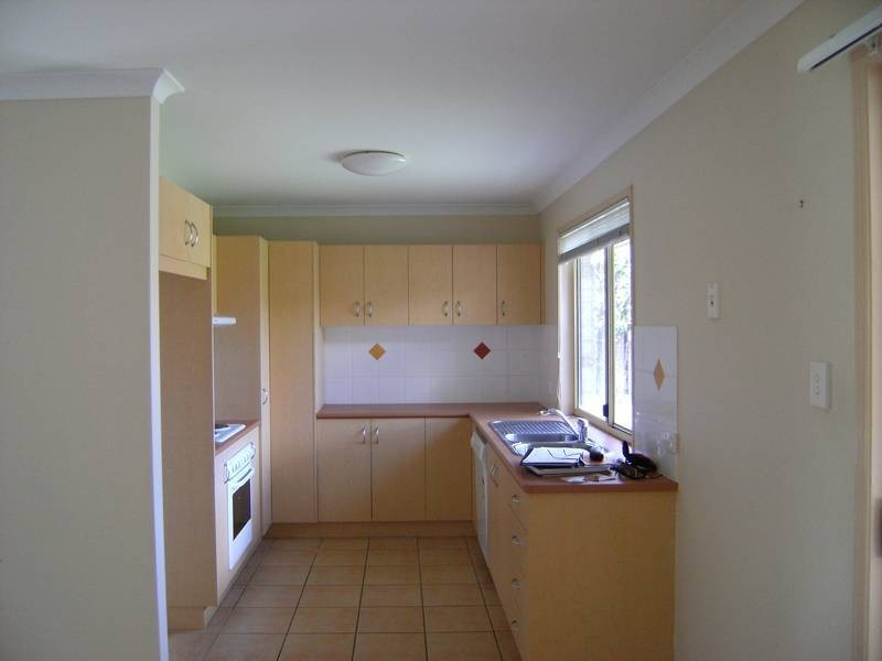 9 Fainter Court, Pacific Pines QLD 4211