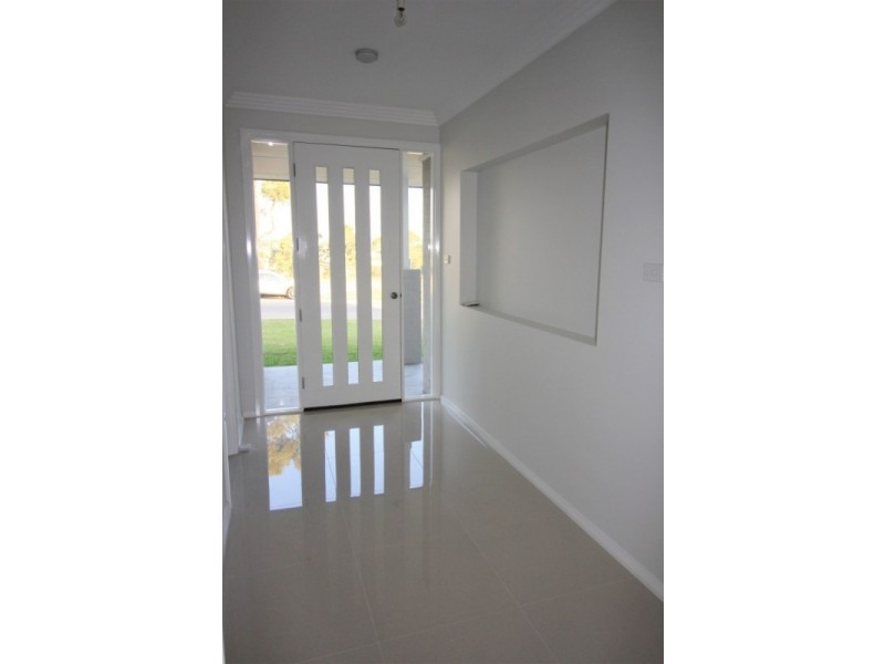 16A Woodlands Drive, Weston NSW 2326