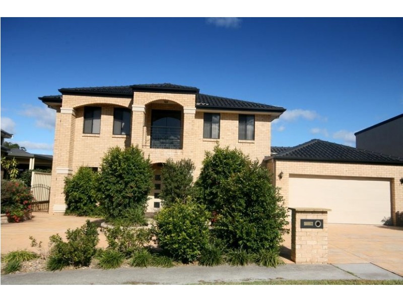 115 Shearwater Drive, Lake Heights NSW 2502