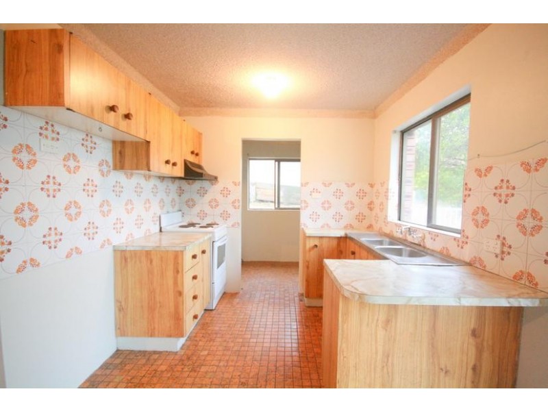 2/15 Melinda Grove, Lake Heights NSW 2502