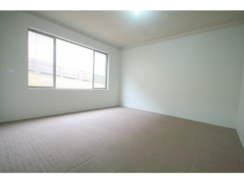 2/15 Melinda Grove, Lake Heights NSW 2502