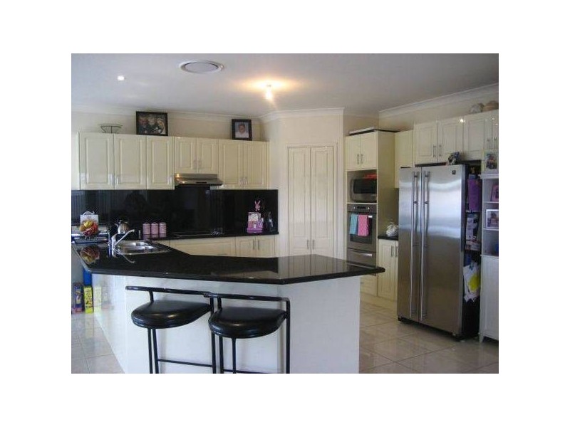 6 Bowerbird Street, Maryland NSW 2287