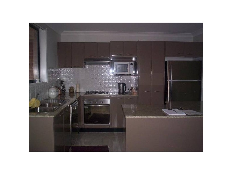 4 Churnwood Drive, Fletcher NSW 2287