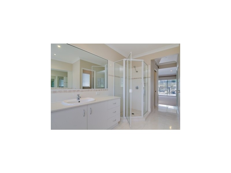 15 Riverside Parade, Trinity Park QLD 4879