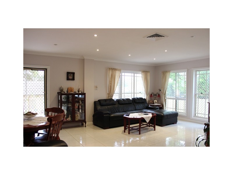 24 Cooeeyana Parade, Mount Lewis NSW 2190