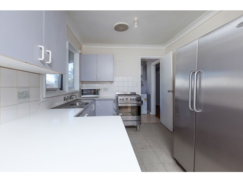 82 Eucalyptus Drive, Macquarie Fields NSW 2564