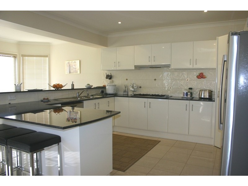 20 First Avenue, Macquarie Fields NSW 2564