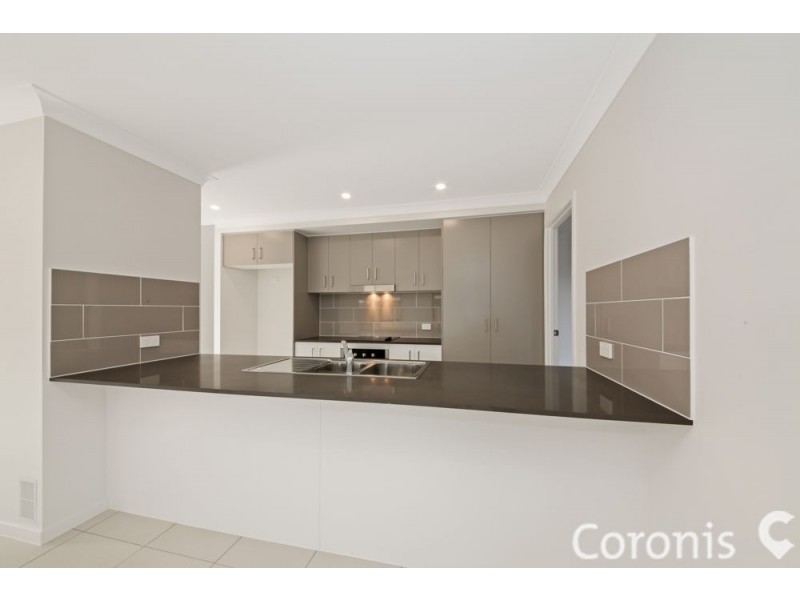 9 Compass Way, Newport QLD 4020