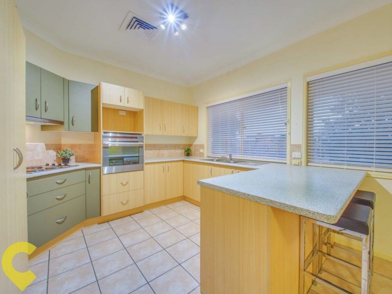 9 Reginald Avenue, Arana Hills QLD 4054