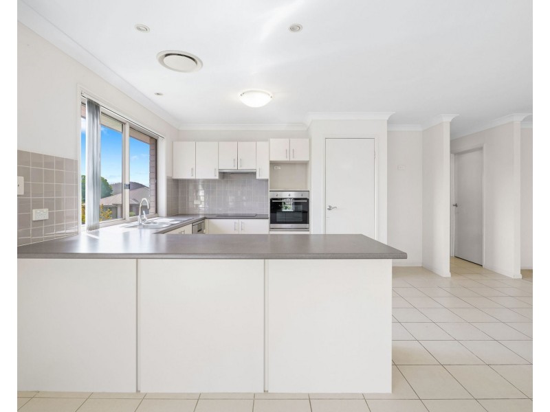 20 Sangster Crescent, Pacific Pines QLD 4211
