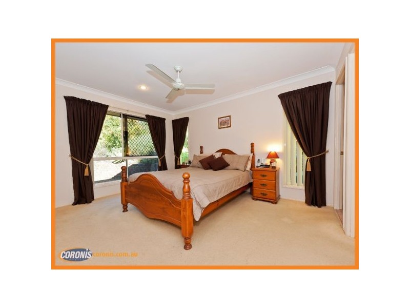 8 Woodward Lane, Pacific Pines QLD 4211