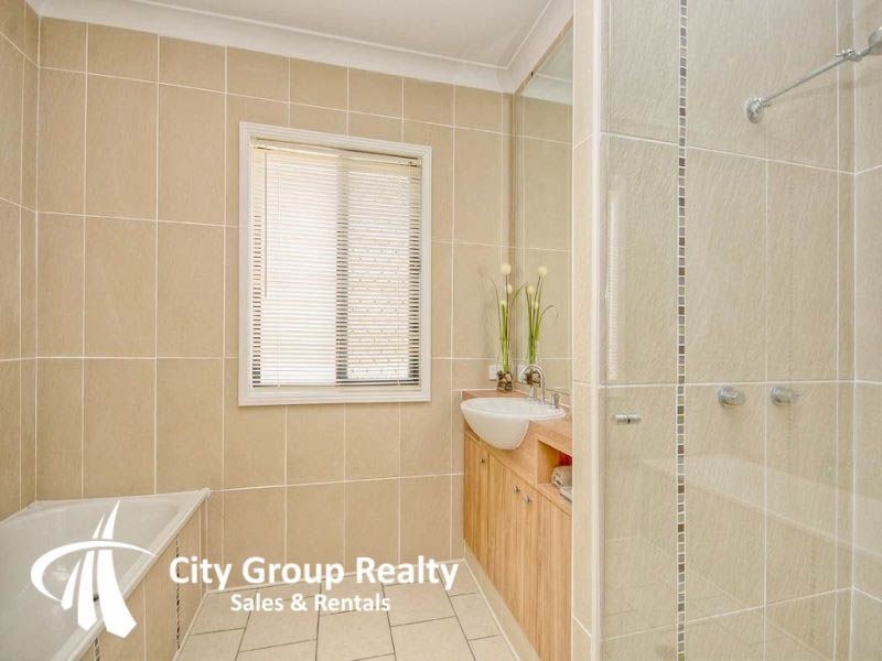 8 Redbud Lane, Robina QLD 4226