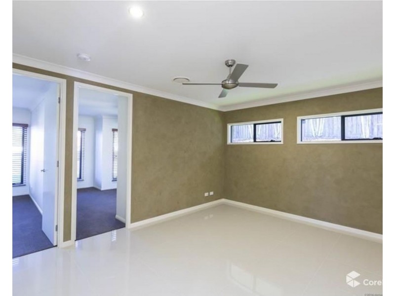 8 McAuley Parade, Pacific Pines QLD 4211