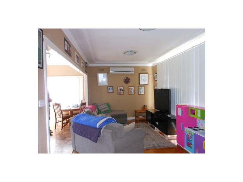 56 Waterside Cres, Carramar NSW 2163