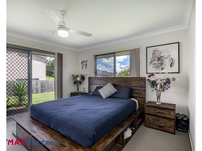8 Sweeney Street, Kearneys Spring QLD 4350