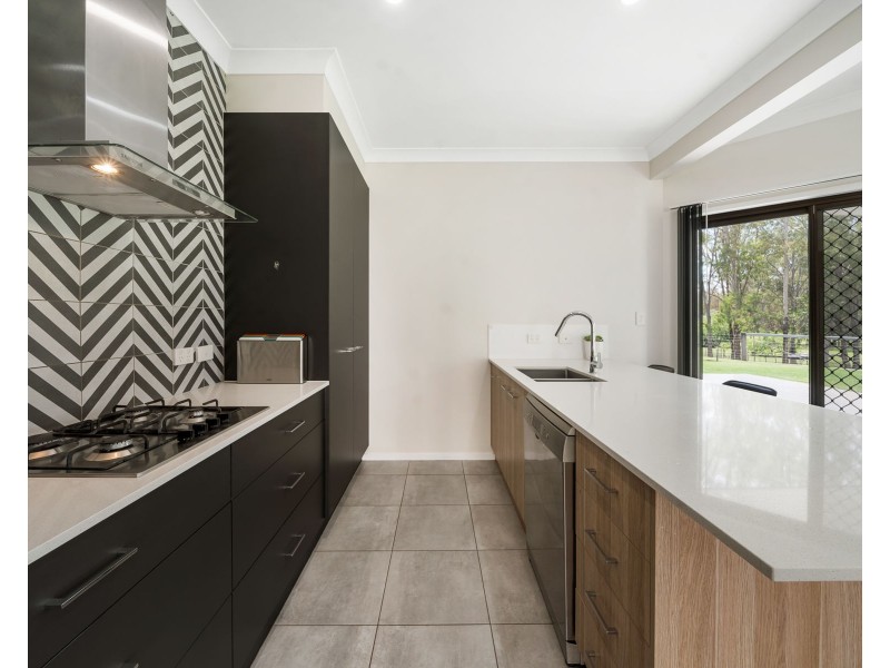 243 Postmans Ridge Road, Postmans Ridge QLD 4352