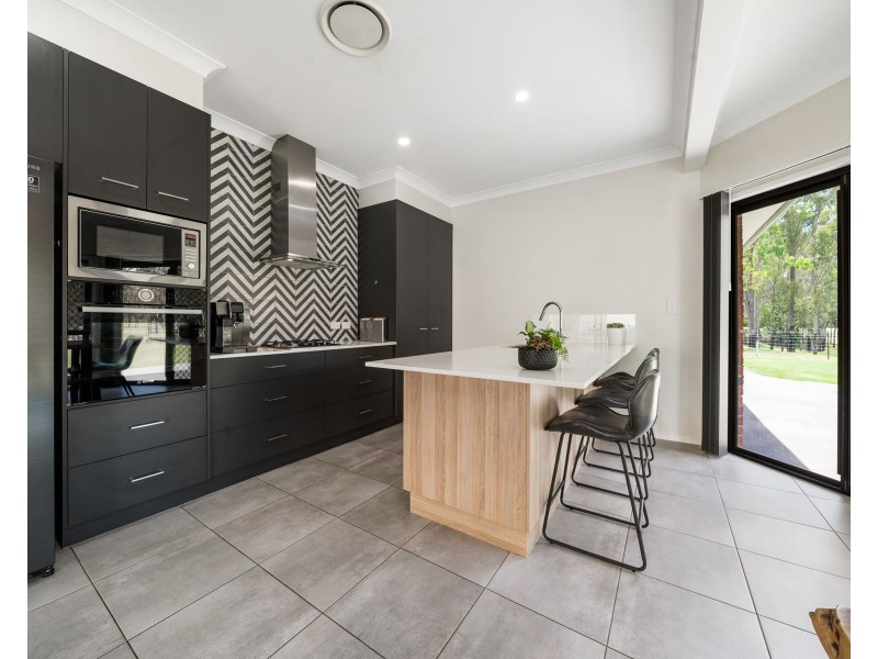 243 Postmans Ridge Road, Postmans Ridge QLD 4352