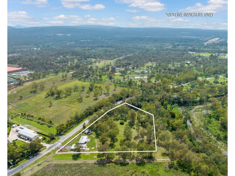 243 Postmans Ridge Road, Postmans Ridge QLD 4352