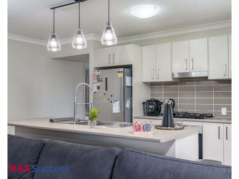 8 Sweeney Street, Kearneys Spring QLD 4350