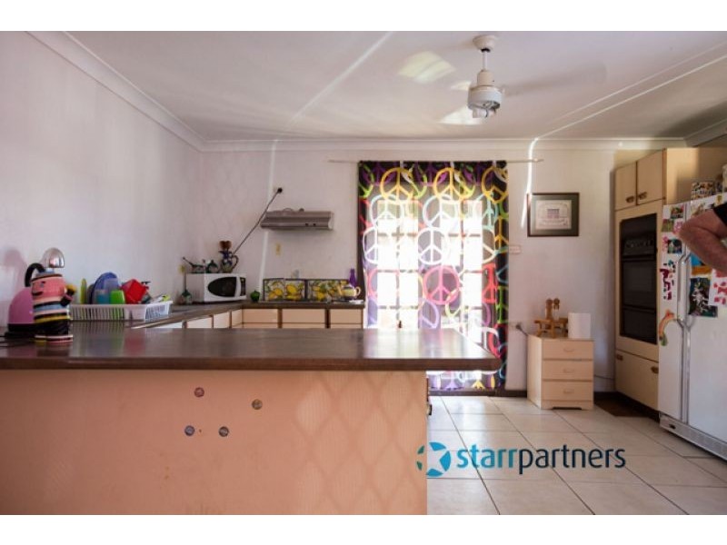 26 Tea Tree Cres, Macquarie Fields NSW 2564