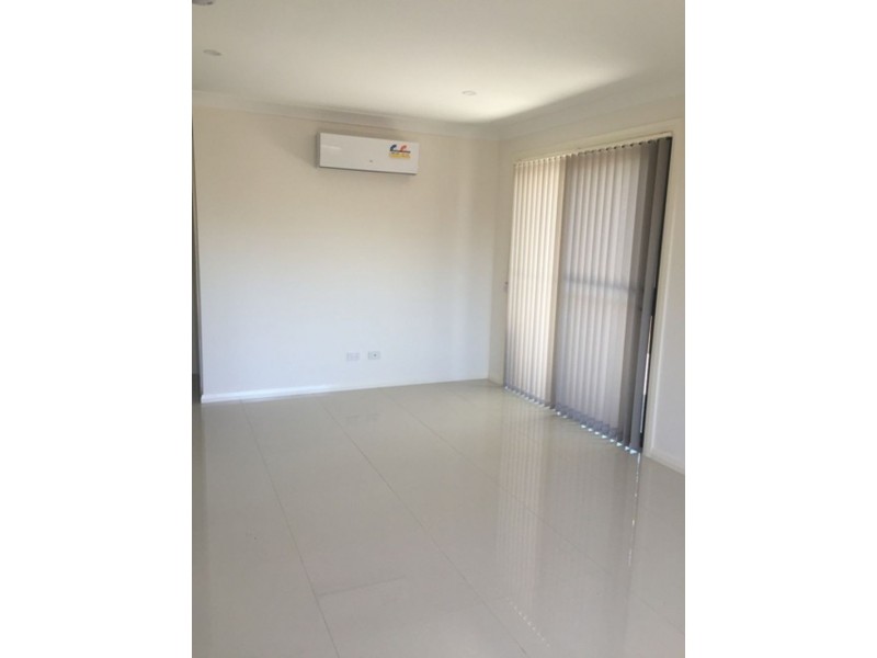 15A Guernsey Ave, Minto NSW 2566