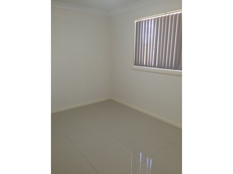 15A Guernsey Ave, Minto NSW 2566