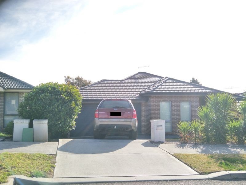 15 Carruthers St, Minto NSW 2566