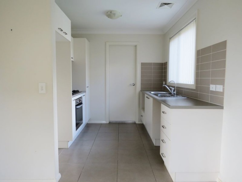 61 Northampton Drive, Glenfield NSW 2167