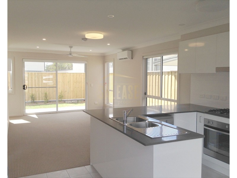 50 Mellish Pde, Glenfield NSW 2167