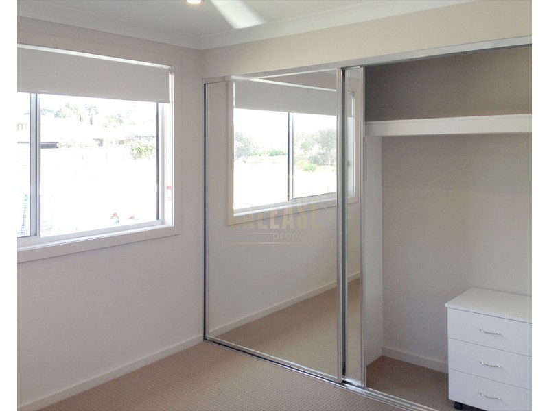 50 Mellish Pde, Glenfield NSW 2167
